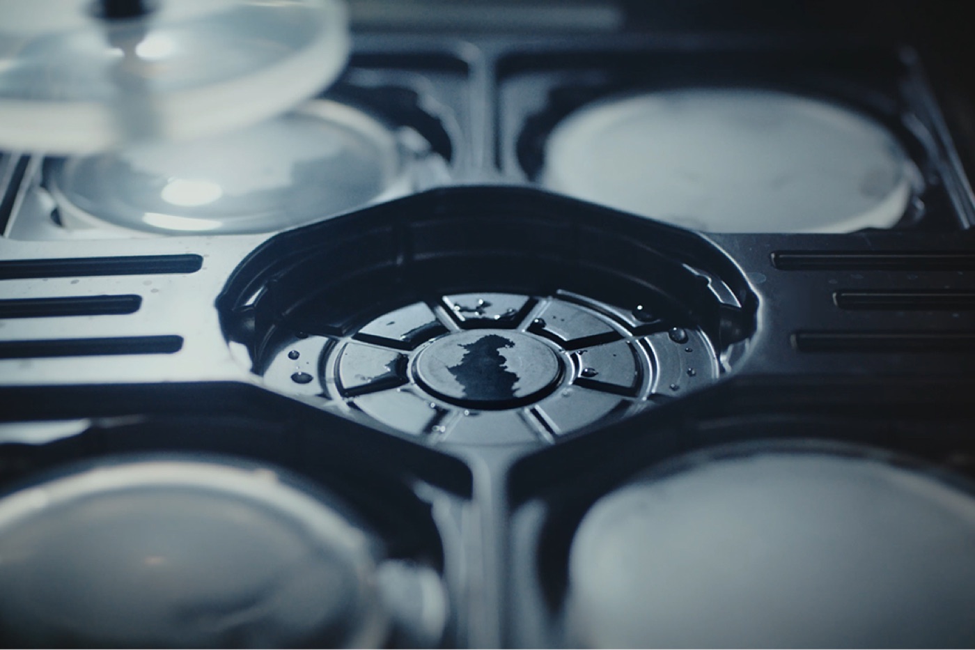 Optical components and precision manufacturing equipment pictured by Sigma
