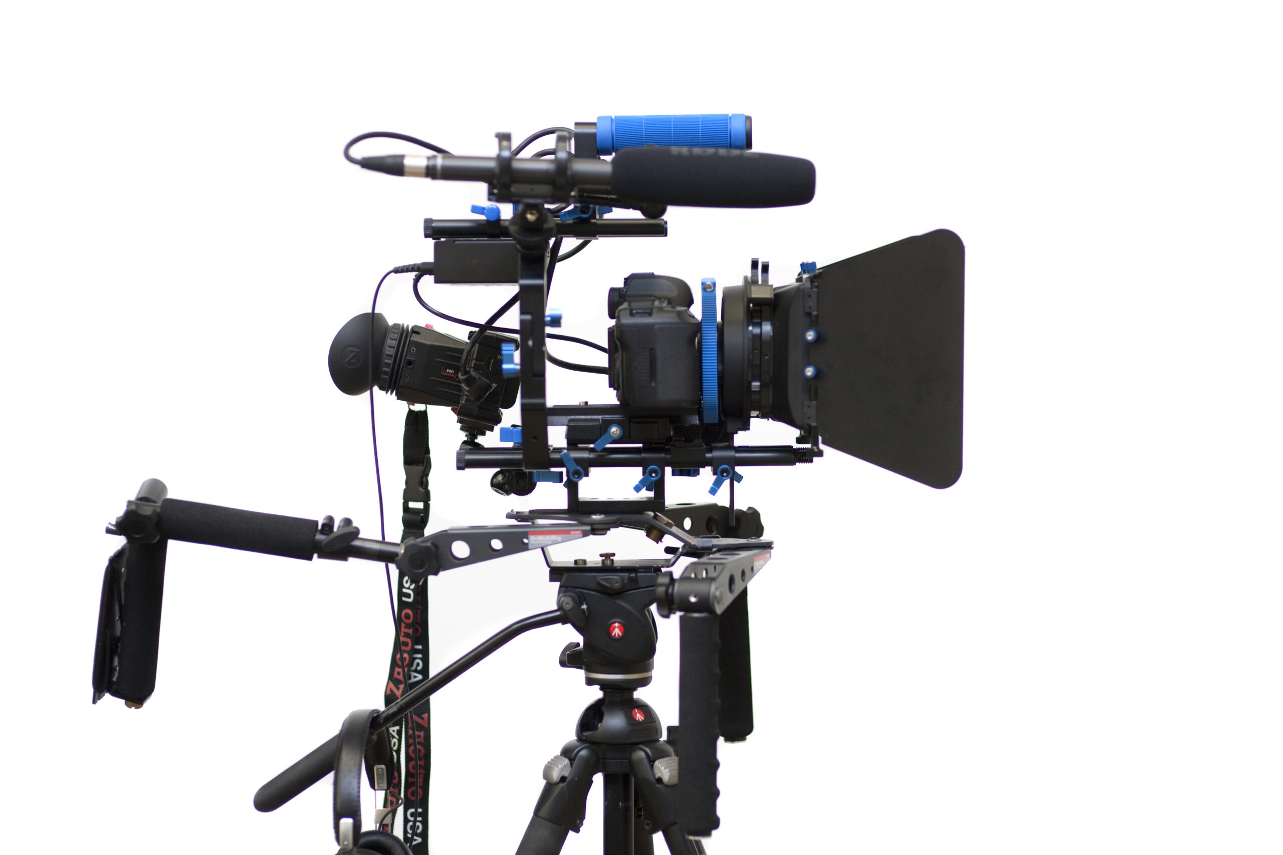 DSLR video rig with camera, microphone, matte box, support rails and handles.