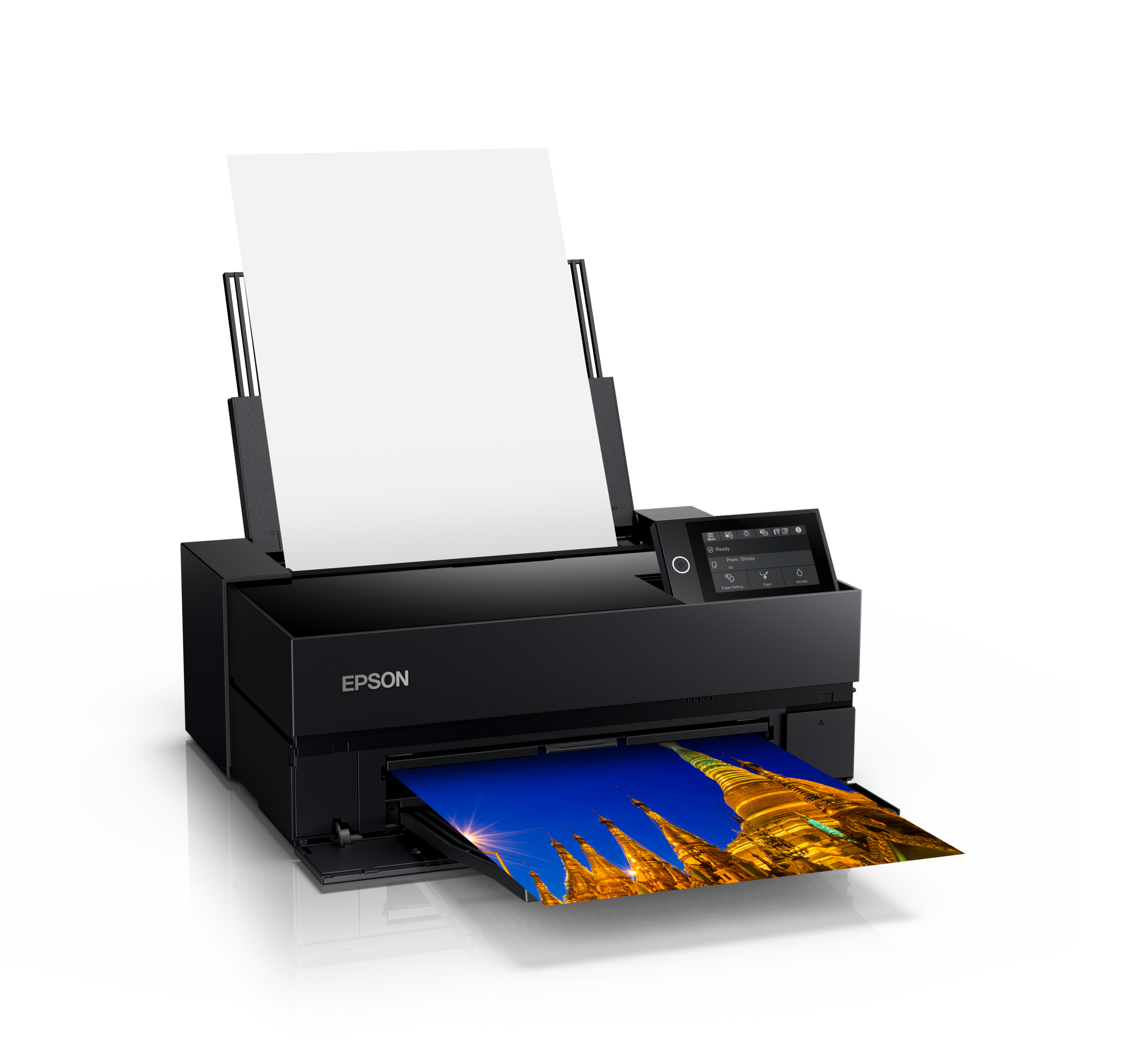 Black Epson SureColor P700 printer with rear paper support raised and a color photograph in the output tray.