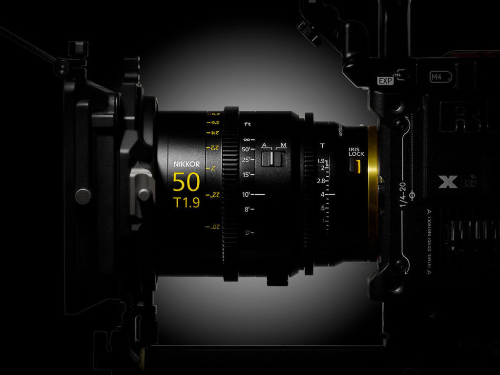 Nikon development image of the NIKKOR Z CINEMA 50mm T1.9 VV lens between cinema camera components.